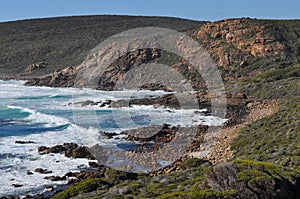 Rugged coastline with waves crashing, WA, Australia