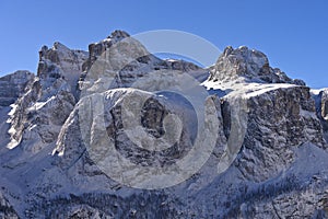 Rugged rock faces of the Sellastock mountain massif in winter, Dolomite, South Tyrol, Italy