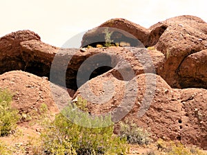 Rugged rock formation and desert scrub at Hole-in-the-Rock, Arizona