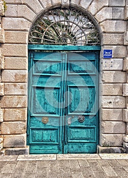 Rugged turquoise doors