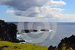 Rugged volcanic cliffs and coastline in Rapa Nui island Easter Island