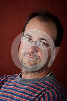 Rugged young man wearing glasses