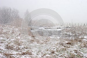 Ruhr valley meadows during snowfall