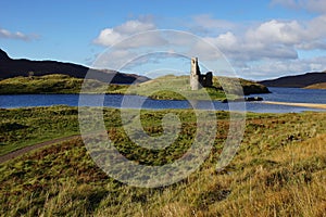 The Ruin of 16th Century Ardvreck Castle sat on a Rocky Promontory in Loch Assynt, Sutherland, Scotland, UK