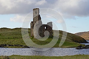 The Ruin of 16th Century Ardvreck Castle sat on a Rocky Promontory in Loch Assynt, Sutherland, Scotland, UK