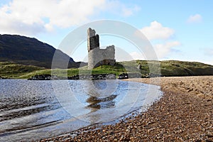 The Ruin of 16th Century Ardvreck Castle sat on a Rocky Promontory in Loch Assynt, Sutherland, Scotland, UK