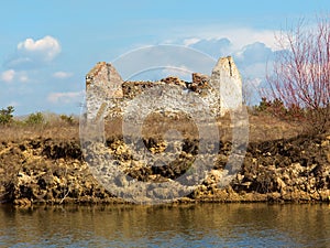Ruin on a lake shore