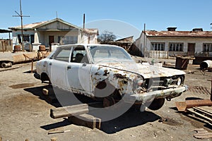 Ruin of old car in Humberstone, Chile