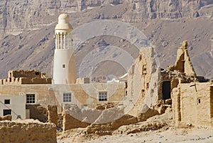 Ruin of an old mud brick fortress and a village mosque, near the city of Seiyun, Yemen