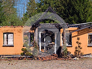 Ruin and remains of a burned down house