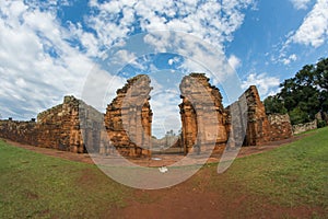 Ruinas de San Ignacio Mini in San Ignacio, Misiones, Argentina with trees under cloudy sky