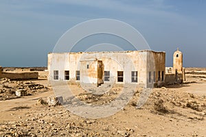 Ruined ancient old Arab pearling and fishing town Al Jumail, Qatar. The desert at coast of Persian Gulf.