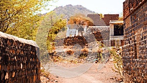 Broken, ruined, abandoned, damaged old Hut, cottage in Indian village rural countryside area.