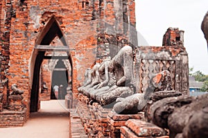 Ruined Buddha sculpture of Wat Chai Watthanaram, Ayutthaya, Thai