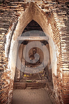 Ruined Buddha sculpture of Wat Chai Watthanaram, Ayutthaya, Thai