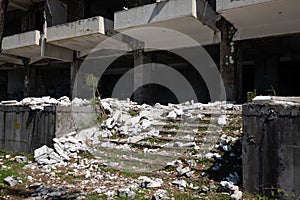 Ruined buildings because of decrepitude or natural disaster. Old staircase