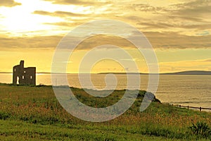 Ruined castle on a cliffs of Ballybunion in Kerry, Ireland