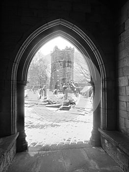 The ruined church of heptonstall through an archway