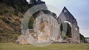 Ruined exterior of priory of Beaumont le Roger, Normandy France