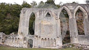 Ruined exterior of priory of Beaumont le Roger, Normandy France, PAN