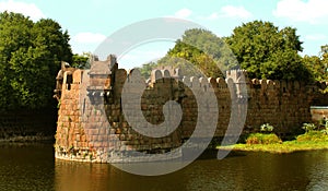 Big battlement of vellore fort with trees