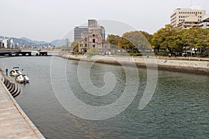 ruined genbaku dome and river in hiroshima (japan)