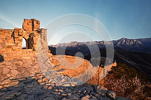 Ruined greatwall in sunrise photo