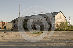 Ruined grey two-storeyed house