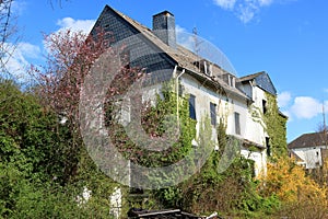 Ruined house of an apartment building after bankruptcy