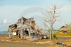 Ruined hut on the beach. Indonesia, Bali