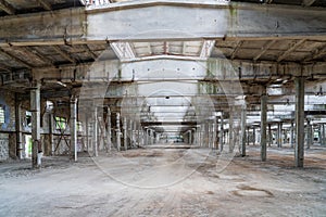 Ruined industrial area, abandoned ruins of a plant or factory. Huge vacant lot. Background