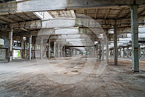 Ruined industrial area, abandoned ruins of a plant or factory. Huge vacant lot. Background