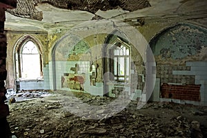 Ruined interior of an abandoned mansion of Khvostov in gothic style