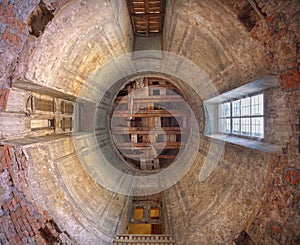 Ruined interior with fallen plaster