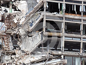 Ruined old concrete building during demolition