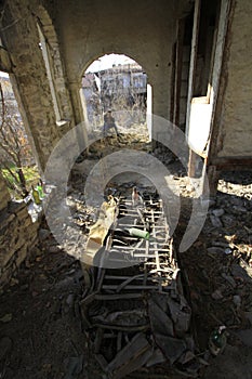 Ruined old house, sad people in it.