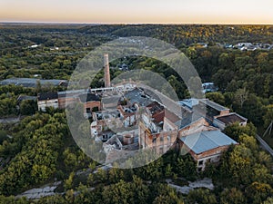 Ruined overgrown abandoned sugar factory in Ramon, aerial view