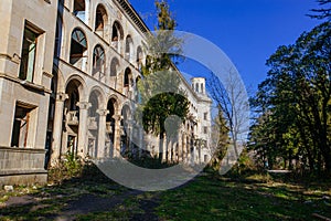 Ruined overgrown old abandoned Soviet sanatorium Iveria, Tskaltubo, Georgia photo