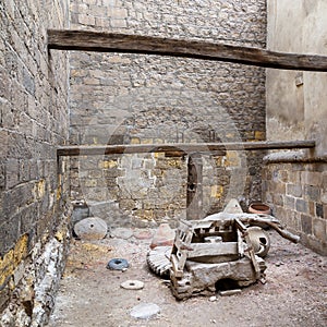 Ruined rotary Flour Mill, located at Ottoman era El Sehemy House, Moez Street, Cairo, Egypt photo