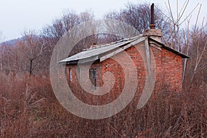 The ruined rural red brick tile house in China