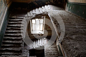 Ruined stairs and window inside old abandoned house,Odessa