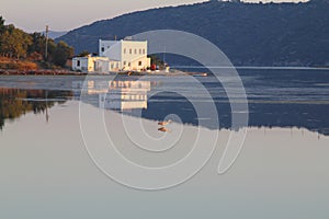 Ruined stone house and reflection