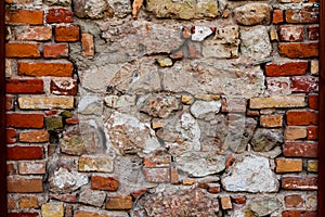 Ruined stone wall collapses in parts photo