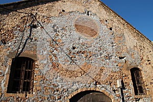 ruined stone warehouse (venitian arsenals) in chania in crete (greece)