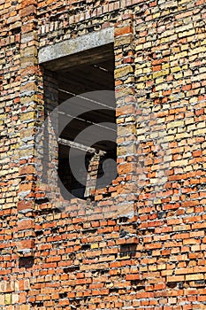 Ruined wall of building. Abandoned to unnecessary houses are destroyed. Self-destruction of abandoned buildings. Conceptually, cri