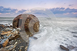 Ruins of abandoned bunker on Azkorri beach