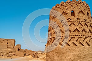 Ruins of the abandoned mud brick city Kharanaq near the ancient city Yazd in Iran photo