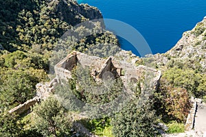 Ruins of Afkule monastery by the Mediterranean coast near Kayakoy village in Mugla province of Turkey