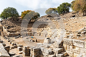 Ruins of the amphitheatre at ancient Greek city Teos in Izmir province of Turkey photo