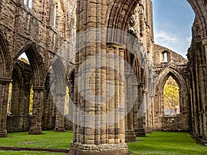 Ruins of an ancient 12th century monastery in the autumn Tintern Abbey, Wales